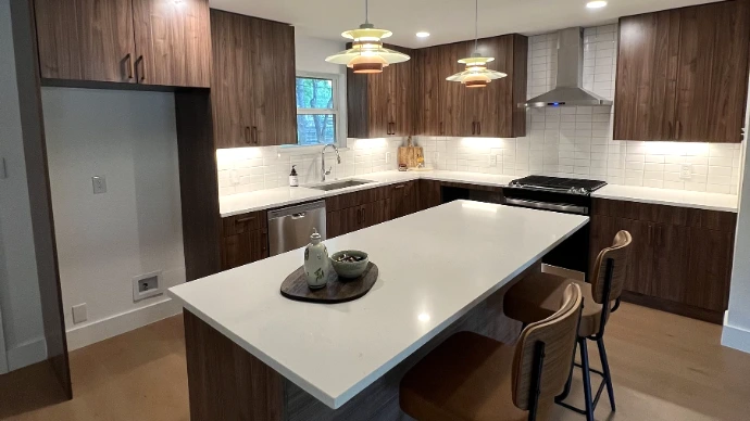 Modern Kitchen with European cabinets and white quartz
